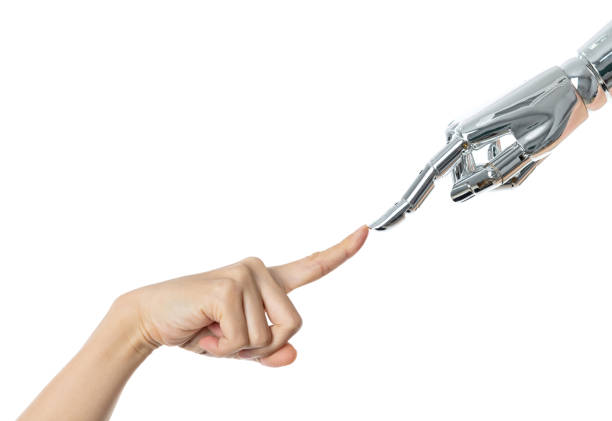 istock Human finger touching robot finger on white background 1160331574