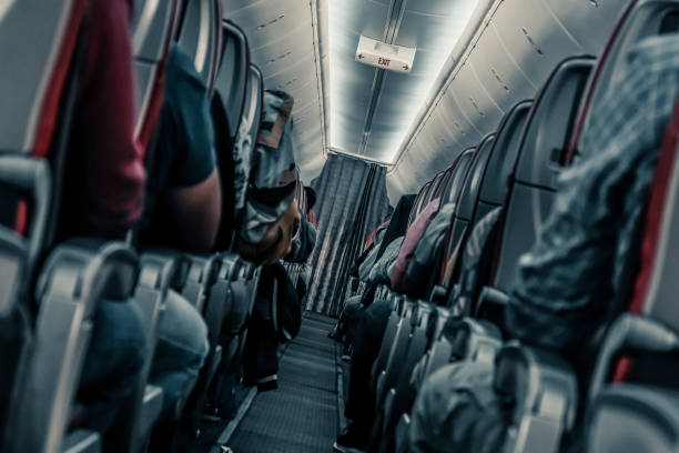Plane danger. Aircraft emergency. Passengers in shock in a turbulence area Plane danger. Passengers in shock in a turbulence area airplane crash photos stock pictures, royalty-free photos & images