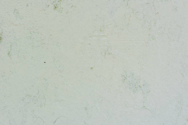 istock Texture of a concrete wall with cracks and scratches which can be used as a background 1160332695