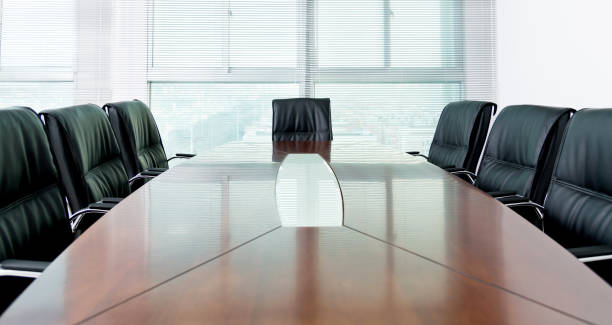 istock Conference table and office chair in board room 1160333950