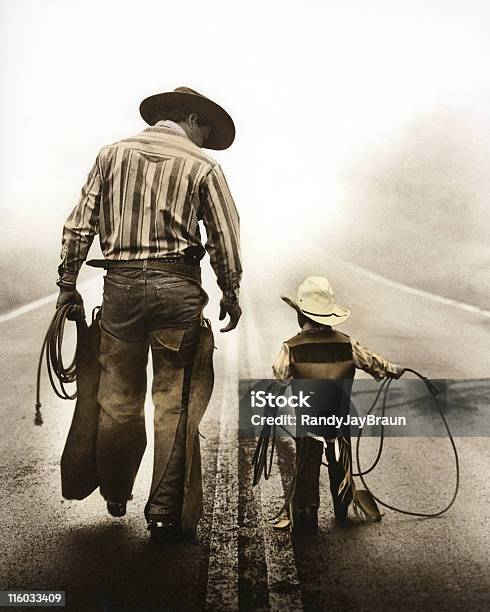 Learning The Ropes Stock Photo - Download Image Now - Cowboy, Father, Son