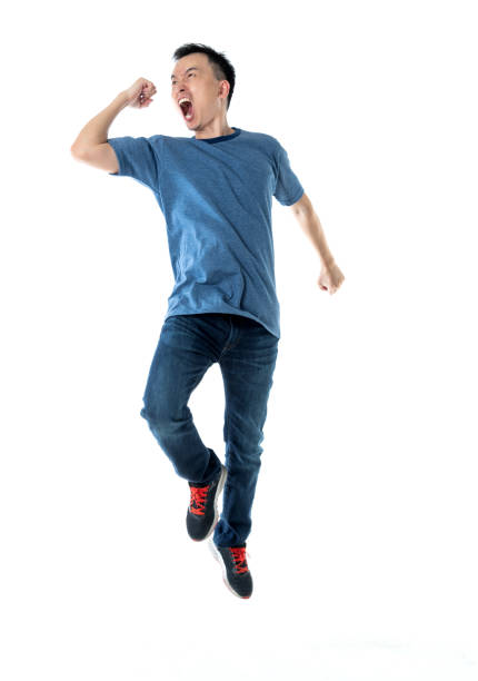 istock Excited man jumping on white background 1160335086