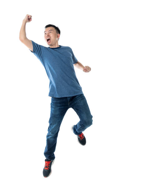 istock Excited man jumping on white background 1160335661