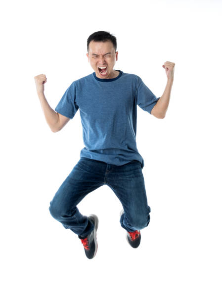 istock Excited man jumping on white background 1160335674