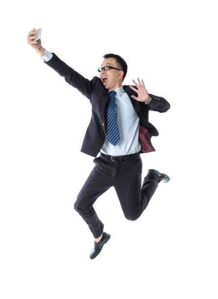 istock Businessman taking a selfie on white background 1160336723