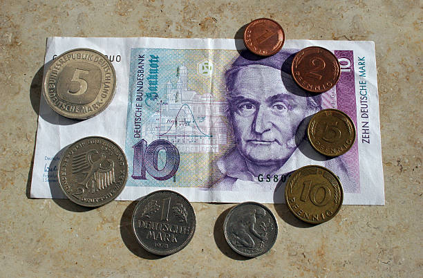 Series of DM coins and ten-mark notes