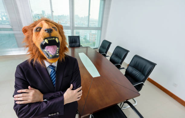 istock Businessman wearing a mask in board room 1160338192