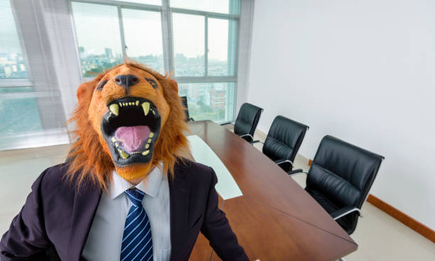 istock Businessman wearing a mask in board room 1160338215
