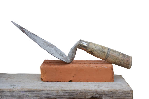 istock Wall Forming equipment with Industrial worker using trowel and tools for building exterior walls with bricks and mortar on wooden scaffolding in the construction page. 1160343268