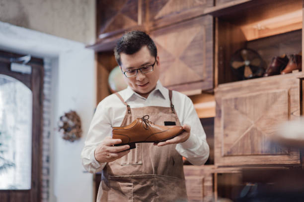 Asian shoe store owner