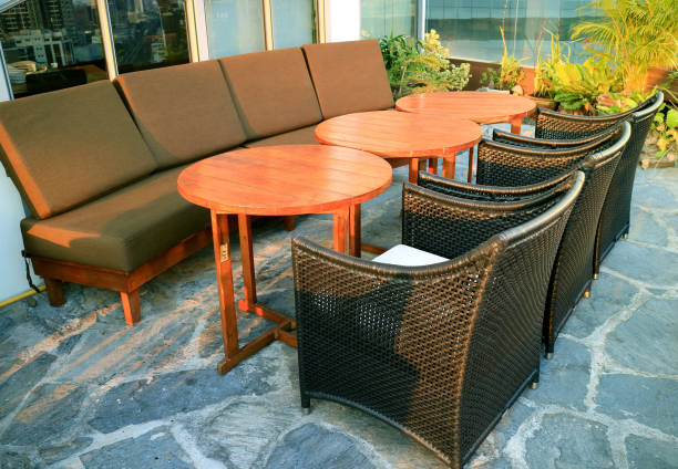istock Empty sofas and chairs with round tables at the rooftop terrace 1160345619