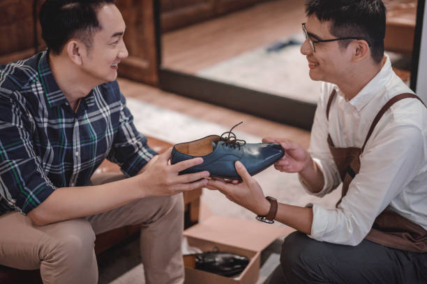 istock Consumer services at boutique shoe stores 1160346661