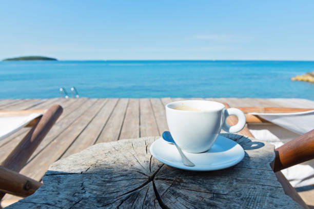 istock Wooden floor with chaise-longues and coffee 1160348122
