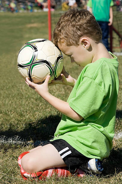 istock Boy with soccer ball 116034920