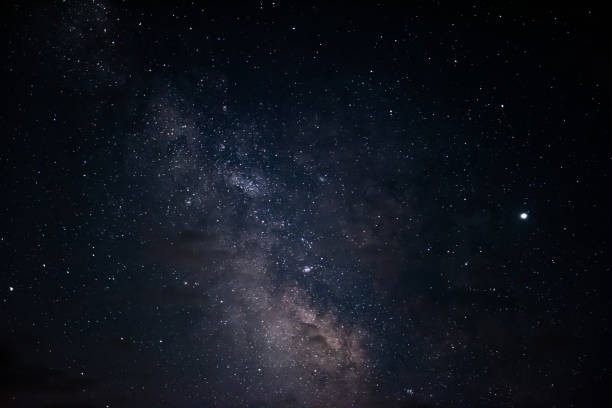 istock Milky Way in night starry sky 1160350452