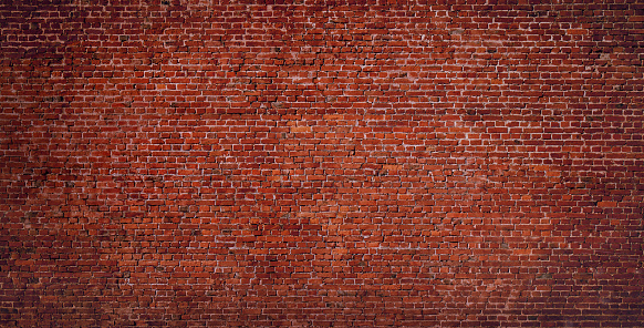Brick Wall Background. Abstract Urban Vintage Brick Texture. Wide Angle Web banner of Old Red Brick With Copy Space for design.