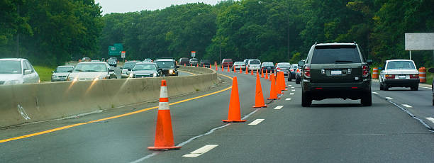 roadwork on the highway orange cones on the road traffic cone photos stock pictures, royalty-free photos & images