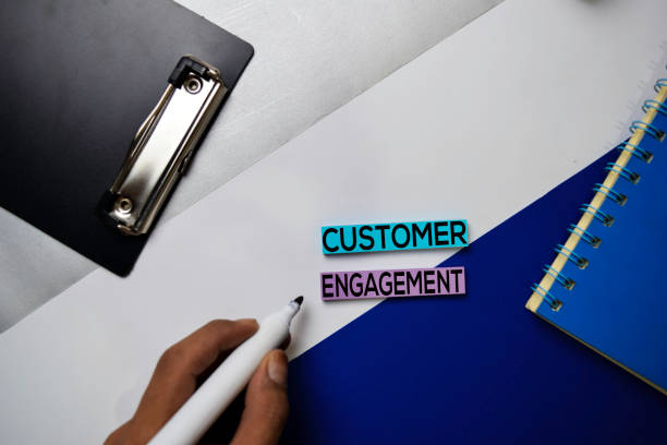 istock Customer Engagement text on sticky notes with color office desk concept 1160363241