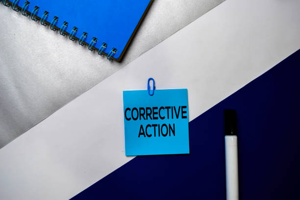 istock Corrective Action text on sticky notes with color office desk concept 1160364124
