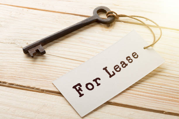 istock real estate lease concept - old key with tag 1160365902