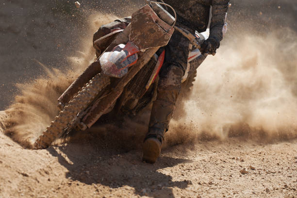 istock Motocross racer accelerating speed in track 1160365993