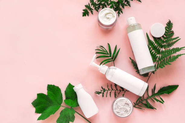 Natural cosmetics and green leaves