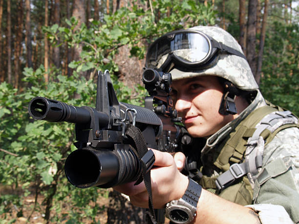 istock Soldier aiming with M4 carbine 116036779