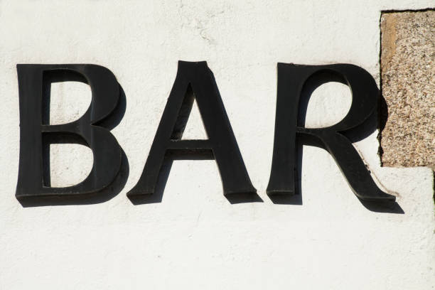 istock Bar,  commercial sign on white wall. 1160368285