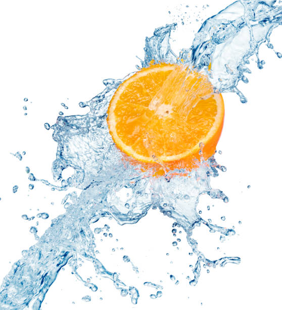 istock half of orange in water splash 1160368393