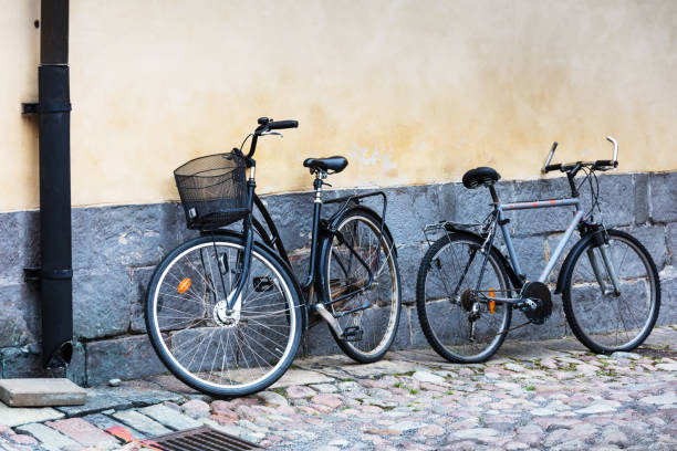 istock two bicycles on a city street 1160369647