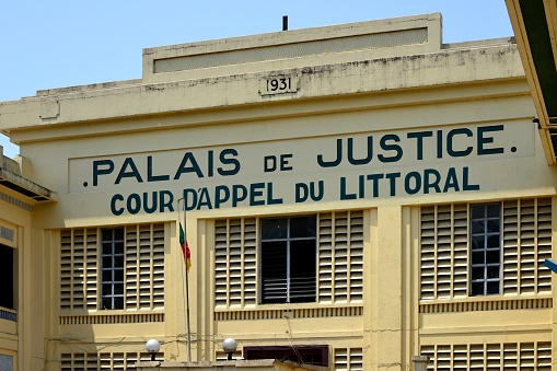Cameroon, Douala: Palace of Justice - Court of Appeal of the Littoral province - 1er arrondissement, Bonanjo - Palais de Justice, cour d'appel - French colonial architecture - facade with slits for ventilation in the tropical climate.