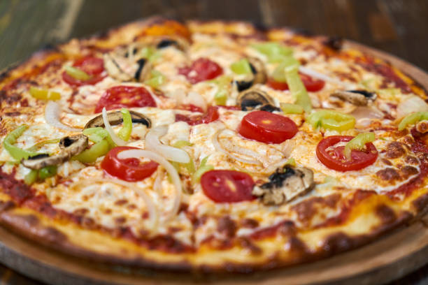 istock Delicious pizza with vegetables 1160370759