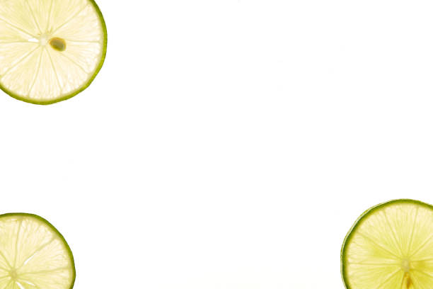 istock slice of fresh lime on white background 1160371915