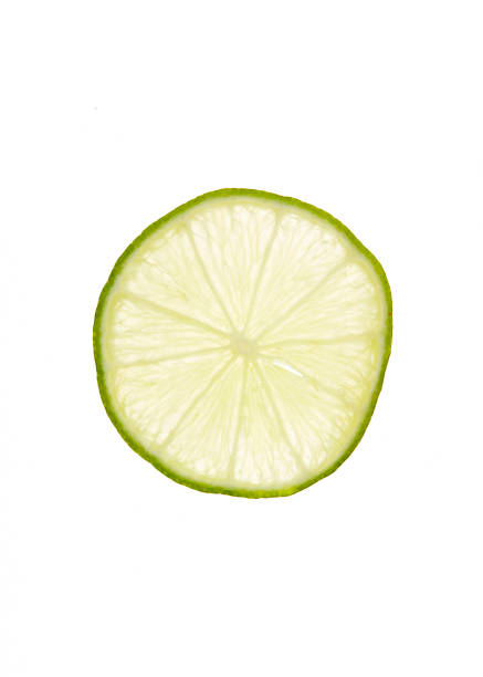 istock slice of fresh lime on white background 1160371917