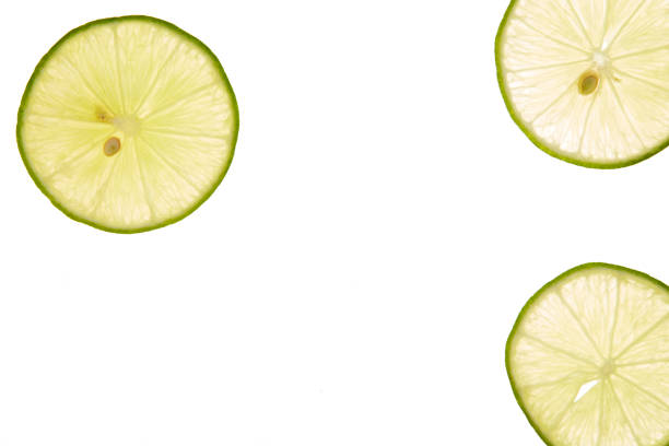 istock slice of fresh lime on white background 1160372453