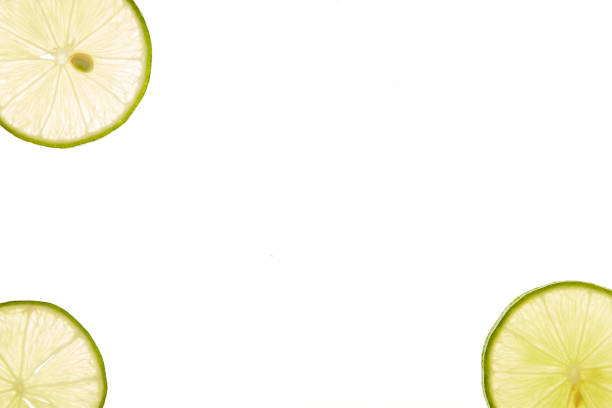 istock slice of fresh lime on white background 1160372455
