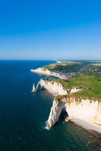istock Wide view of the cliffs of Etretat 1160372812
