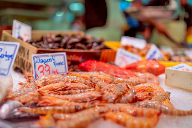 Fresh shrimps on the Spanish fish market.  Selective focus. Bokeh