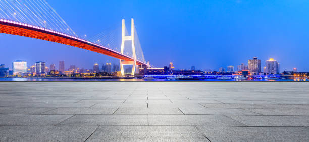 istock Shanghai Nanpu bridge and empty square floor scenery at night 1160382894
