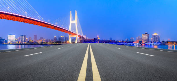 istock Shanghai Nanpu bridge and asphalt road scenery at night 1160384416