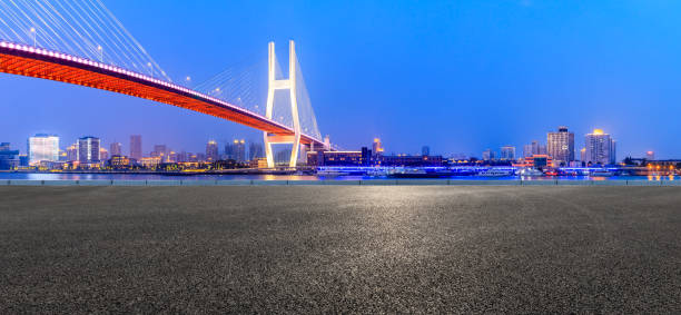 istock Shanghai Nanpu bridge and asphalt road scenery at night 1160384456