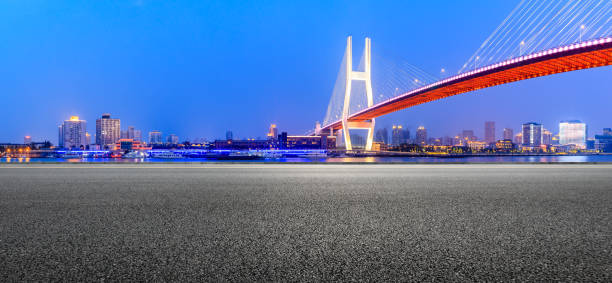 istock Shanghai Nanpu bridge and asphalt road scenery at night 1160384566