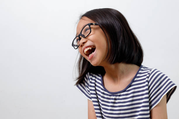 istock Funny and smiling little girl 1160384601