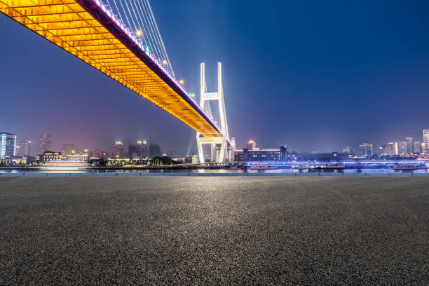 istock Shanghai Nanpu bridge and asphalt road scenery at night 1160384742