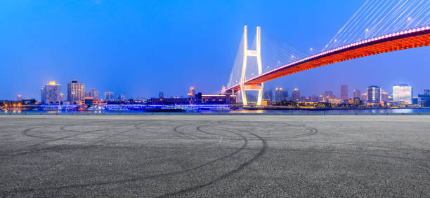 istock Shanghai Nanpu bridge and asphalt road scenery at night 1160384744