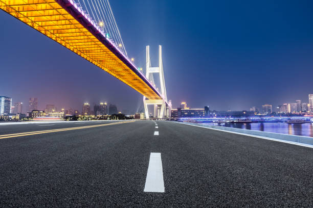 istock Shanghai Nanpu bridge and asphalt road scenery at night 1160384905
