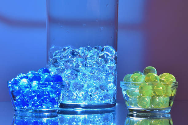 istock Abstract still life of glass shapes in multi-colored light for interior design. 1160388041