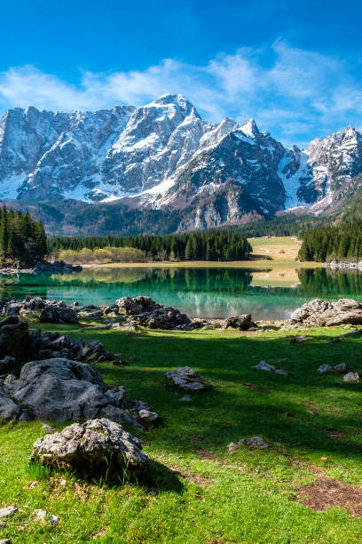 istock Spring morning at the alpine lake 1160388049