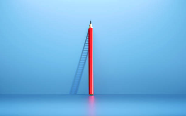 le crayon rouge se penchant sur le mur bleu jette l'ombre d'une échelle - business finance education aspirations photos et images de collection