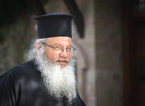 Meteora, Greece -  April 2019 : The portrait of orthodox priest from the Meteora Varlaam Monastery
